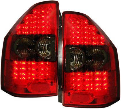 Πίσω φανάρια για Mitsubishi Pajero (2001-2006) - με φιμέ φλας - σετ 2τμχ.