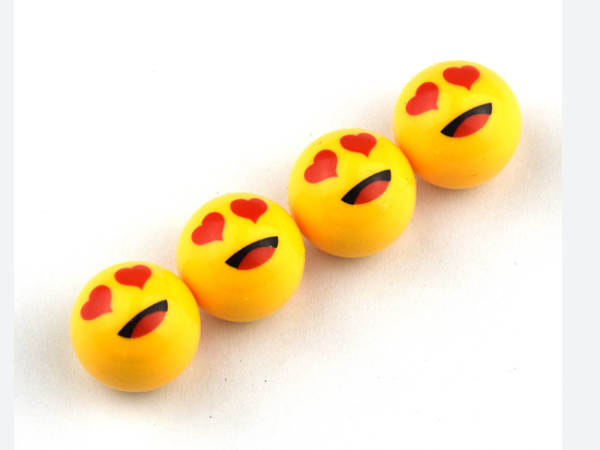 Βαλβίδες τροχών σε σχέδιο emoji φατσούλα